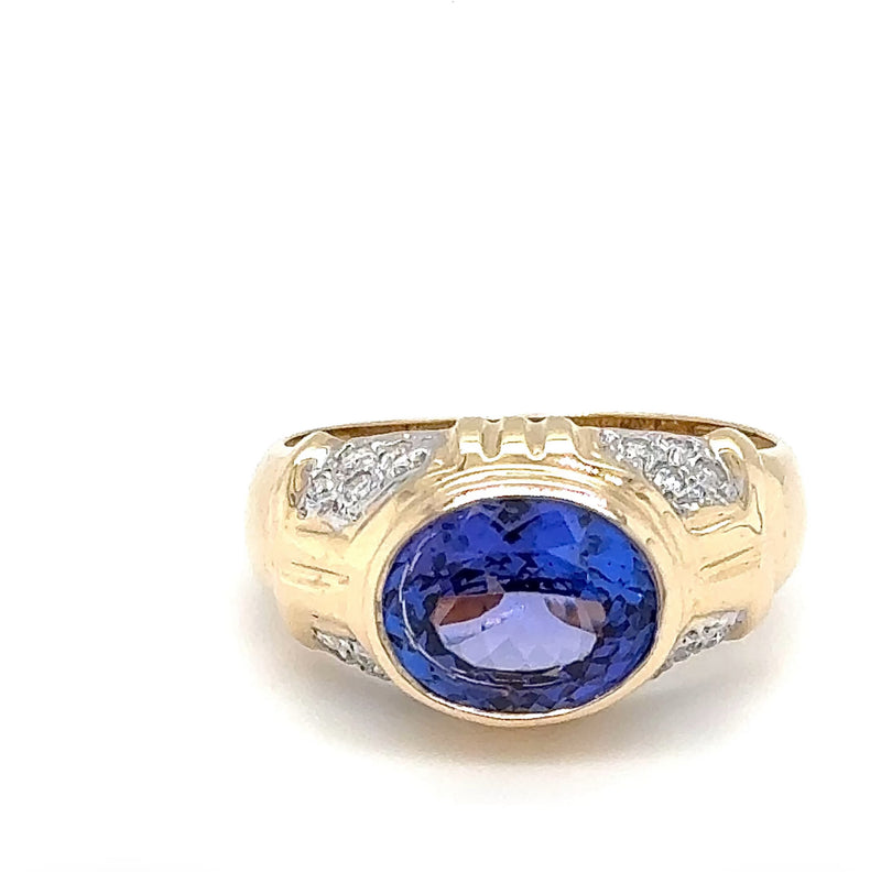 Stilvoller Ring in 14 Karat Gelbgold mit feinen Tansanit und Brillanten