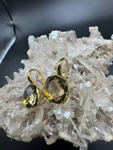 Elegante Kreolen in 18 Karat Gelbgold mit lebhaften Rauchquarzen