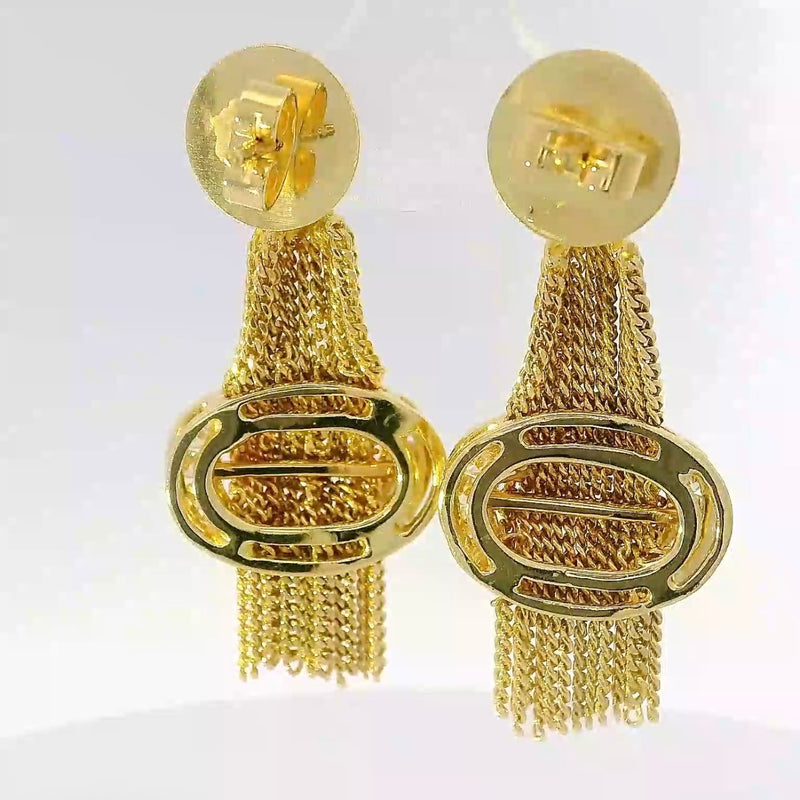 Außergewöhnliche Ohrringe in 18 Karat Gelbgold mit feinsten Brillanten