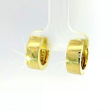 Zeitlose Kreolen in 14 Karat Gelbgold mit Diamanten