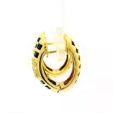 Wirkungsvolle Kreolen in 18 Karat Gelbgold mit Brillanten & Saphiren