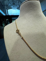 Leuchtende Twist Halskette in 18 Karat Gelbgold mit Federring