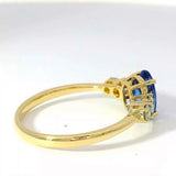 Moderner steinbetonter Ring in 14 Karat Gelbgold mit Tansanit und Brillanten