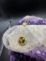 Besonderes Collier in 18 Karat Gelbgold mit gelben Tansanit & Brillanten
