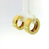 Zeitlose Kreolen in 14 Karat Gelbgold mit Diamanten