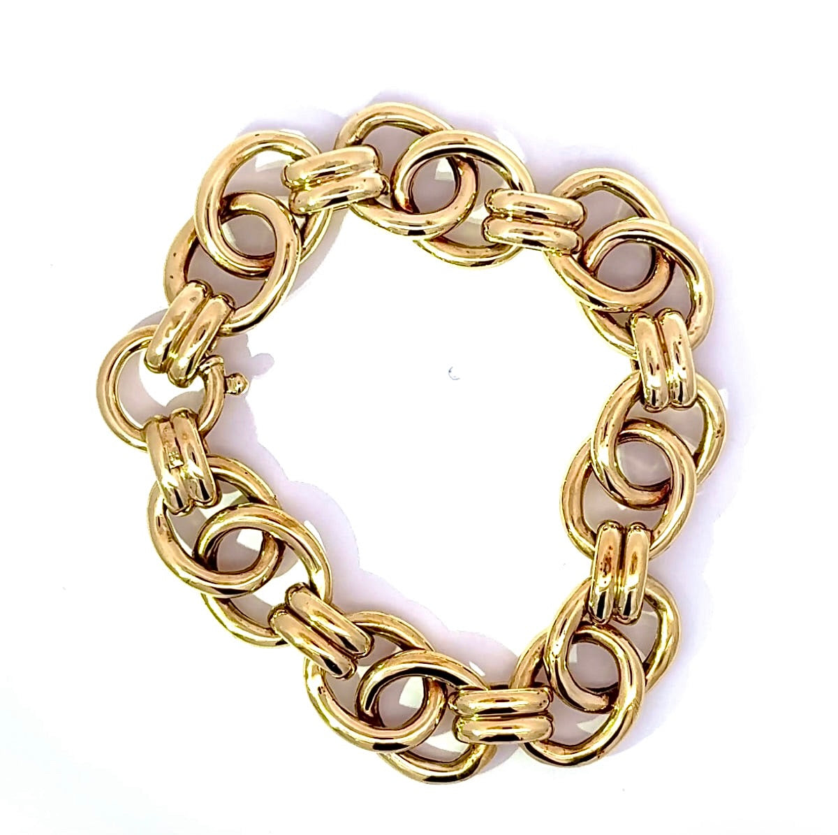 Wide 14 karat yellow gold bracelet with spring ring clasp