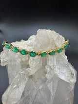 Steinbetontes Armband in 14 Karat Gelbgold mit Smaragden & Brillanten