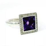 Massiver Ring in 18 Karat Weißgold mit Amethyst und Brillanten