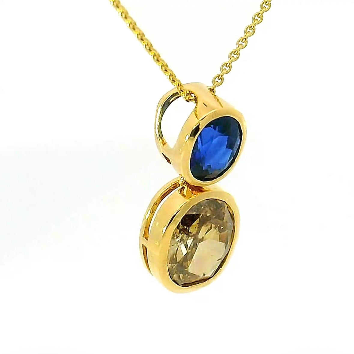 Edler Anhänger in 18 Karat Gelbgold mit hochfeinem Saphir & Fancy Brillant