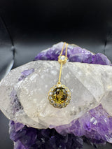 Besonderes Collier in 18 Karat Gelbgold mit gelben Tansanit & Brillanten