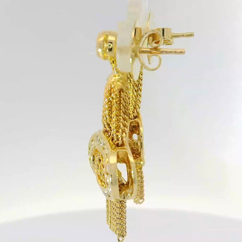 Außergewöhnliche Ohrringe in 18 Karat Gelbgold mit feinsten Brillanten