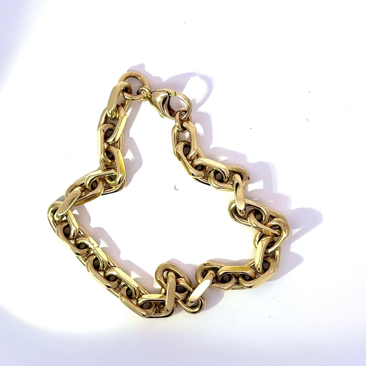 Heavy diamond-cut bracelet in 14 karat yellow gold with lobster clasp