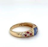 Edler Ring in 18 Karat Gelbgold mit hochfeinen Saphir, Brillanten & Rubine