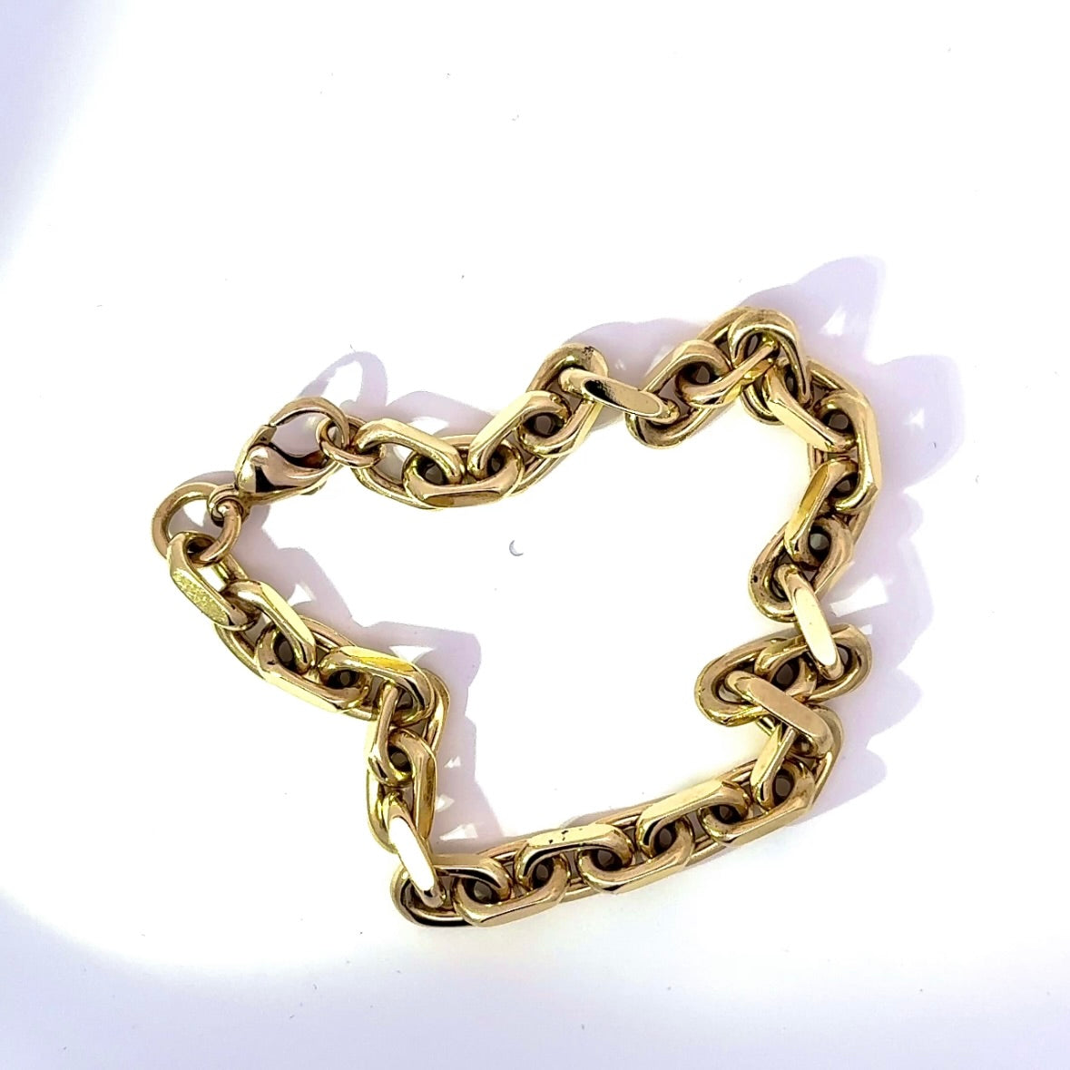 Heavy diamond-cut bracelet in 14 karat yellow gold with lobster clasp