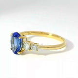 Moderner steinbetonter Ring in 14 Karat Gelbgold mit Tansanit und Brillanten