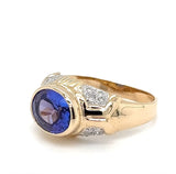 Stilvoller Ring in 14 Karat Gelbgold mit feinen Tansanit und Brillanten