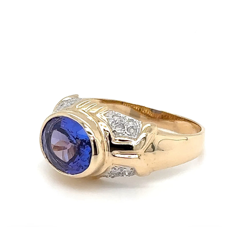 Stilvoller Ring in 14 Karat Gelbgold mit feinen Tansanit und Brillanten