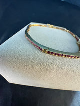 Elegantes Armband in 14 Karat Gelbgold mit rosa Saphiren & Rubinen