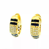 Wirkungsvolle Kreolen in 18 Karat Gelbgold mit Brillanten & Saphiren