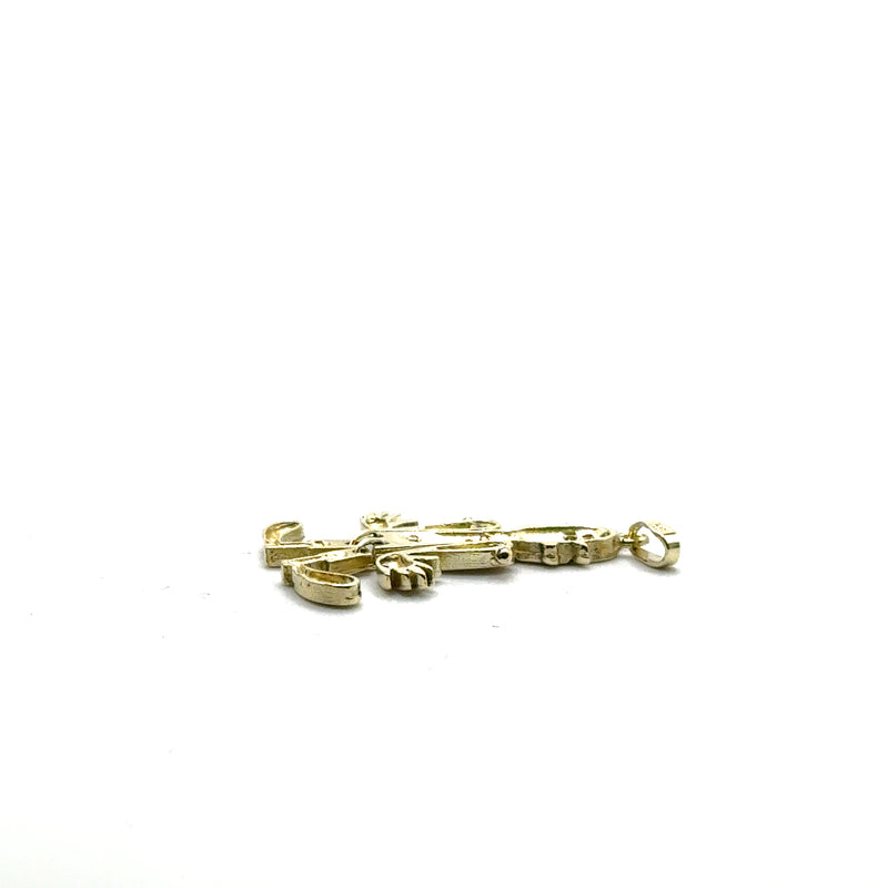 Playful Punch and Judy pendant in 14 carat yellow gold with diamonds