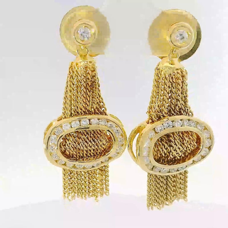 Außergewöhnliche Ohrringe in 18 Karat Gelbgold mit feinsten Brillanten