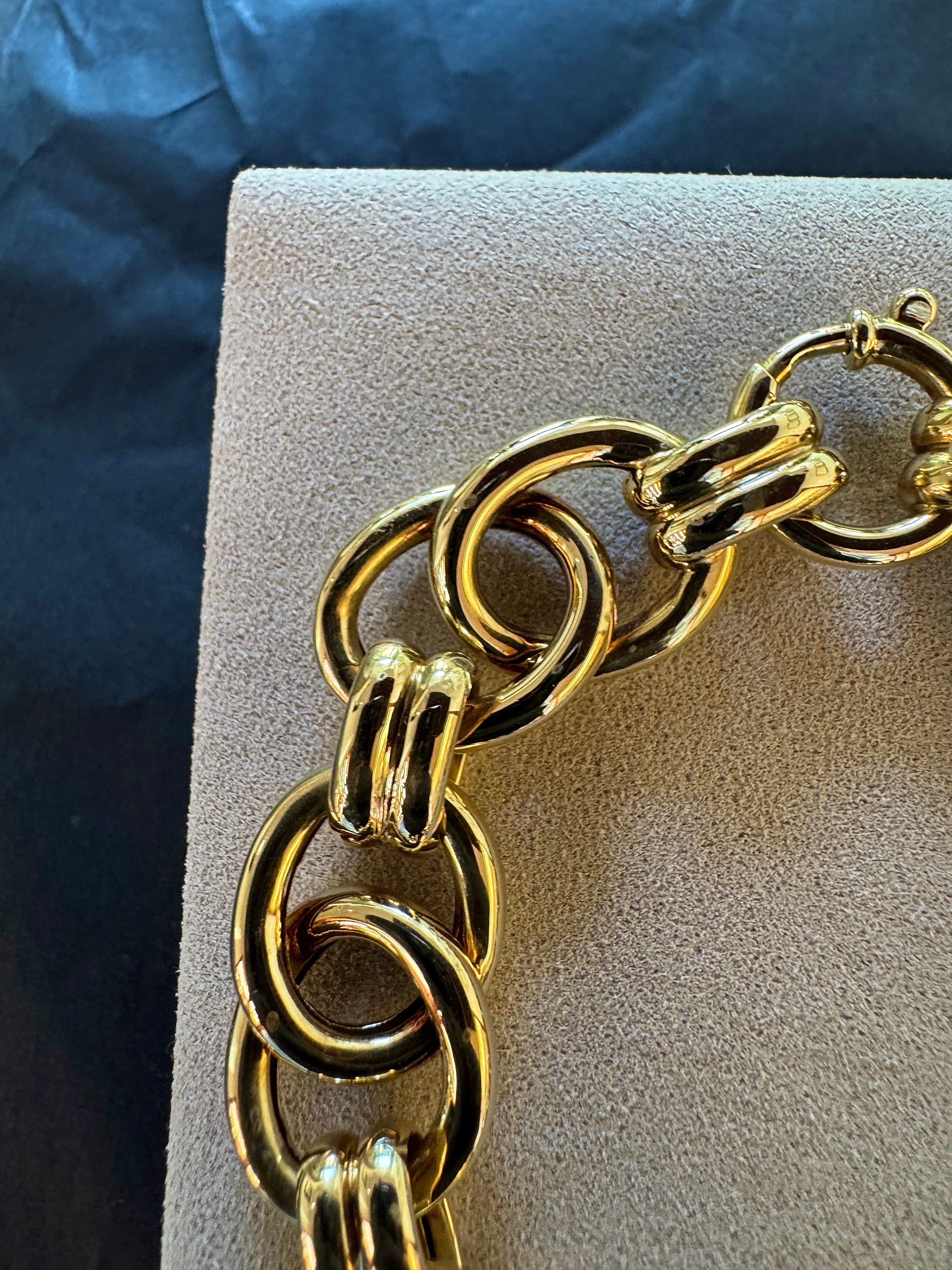 Wide 14 karat yellow gold bracelet with spring ring clasp
