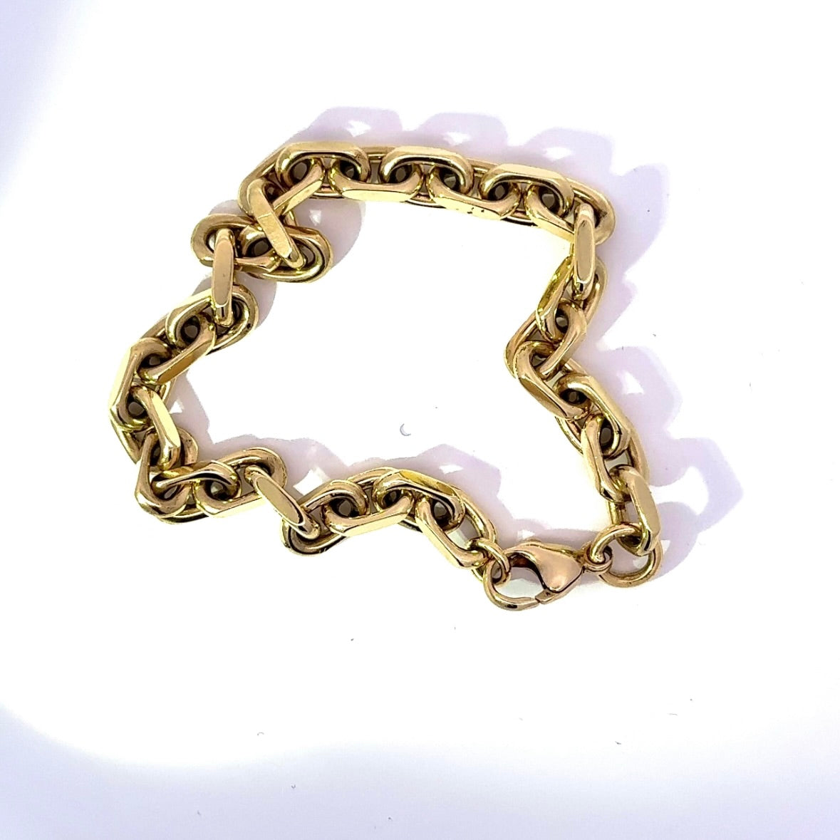 Heavy diamond-cut bracelet in 14 karat yellow gold with lobster clasp