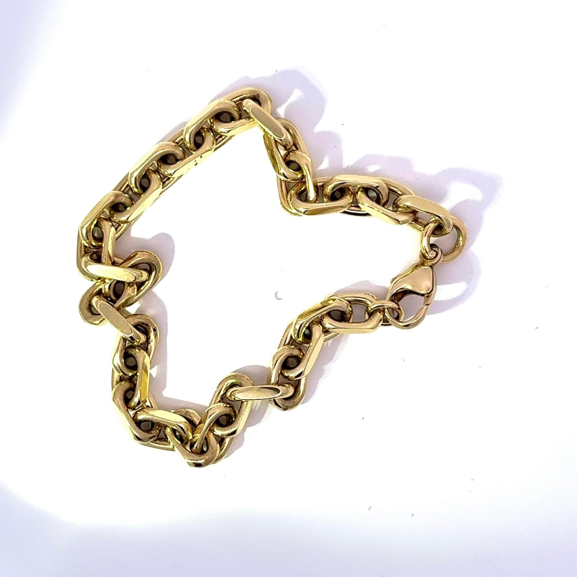 Heavy diamond-cut bracelet in 14 karat yellow gold with lobster clasp