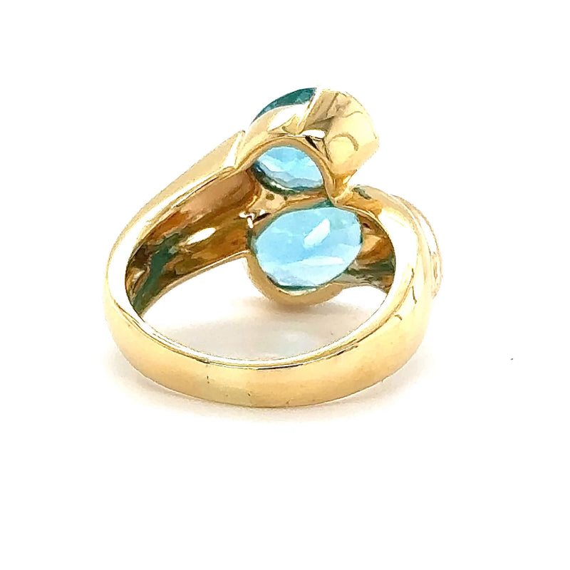 Besonderer Toi et Moi Ring in 18 Karat Gelbgold mit blauen Topas