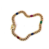 Zeitloses Armband in 14 Karat Gelbgold mit Saphiren, Rubinen und Smaragd