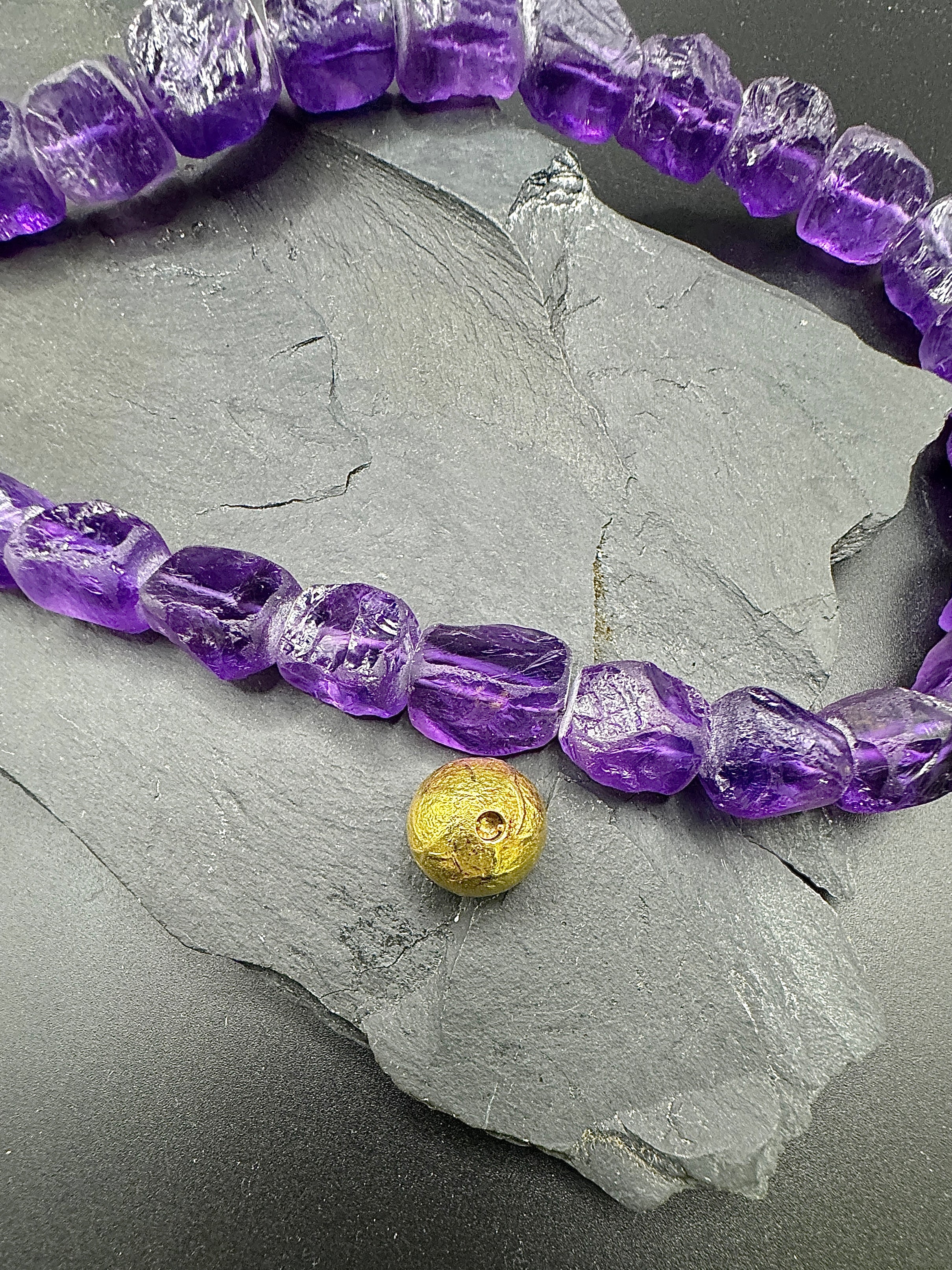 Fancy necklace made of fine amethysts with 18 carat gold clasp