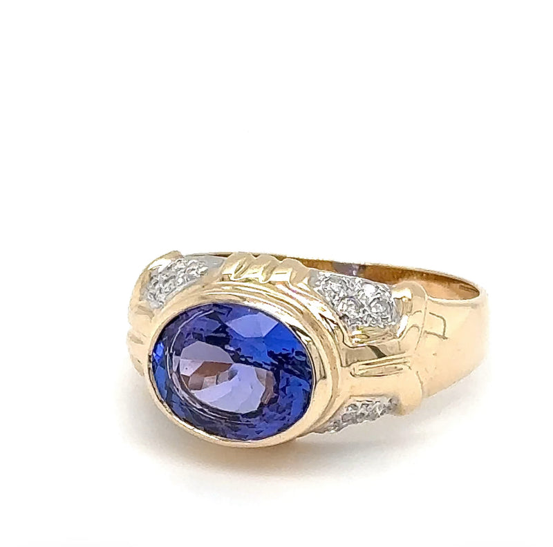 Stilvoller Ring in 14 Karat Gelbgold mit feinen Tansanit und Brillanten