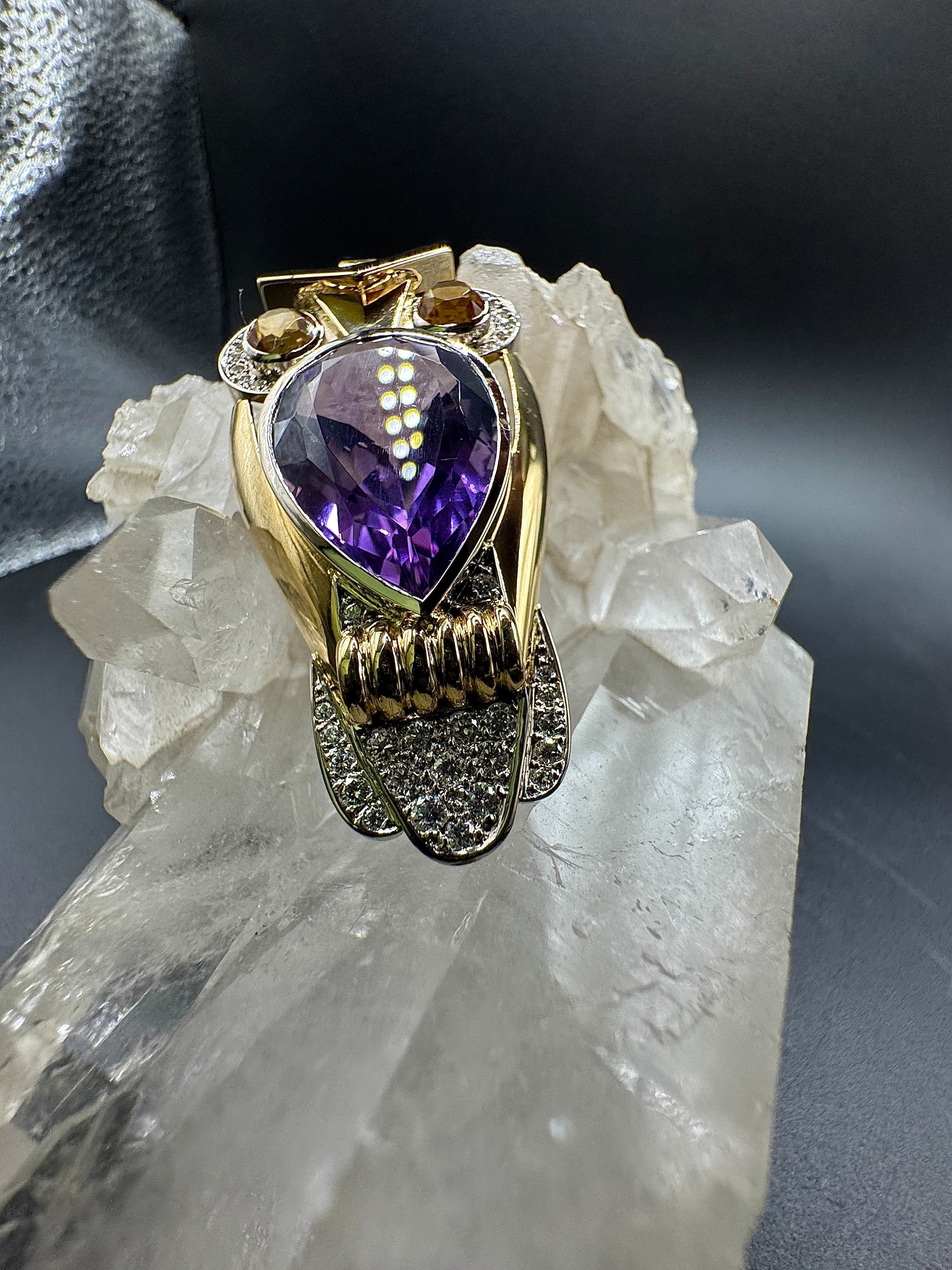 Fancy owl in 14 carat yellow and white gold with amethyst, citrine and diamonds