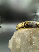 Massiver und edler Armreif in 18 Karat Gold mit hochfeinen Brillanten