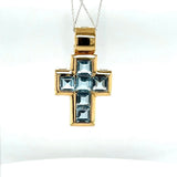 High-quality handmade cross pendant in 18 carat yellow gold with fine topazes