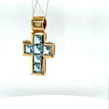 High-quality handmade cross pendant in 18 carat yellow gold with fine topazes