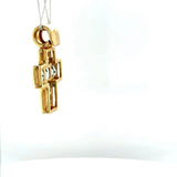 High-quality handmade cross pendant in 18 carat yellow gold with fine topazes