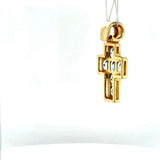 High-quality handmade cross pendant in 18 carat yellow gold with fine topazes