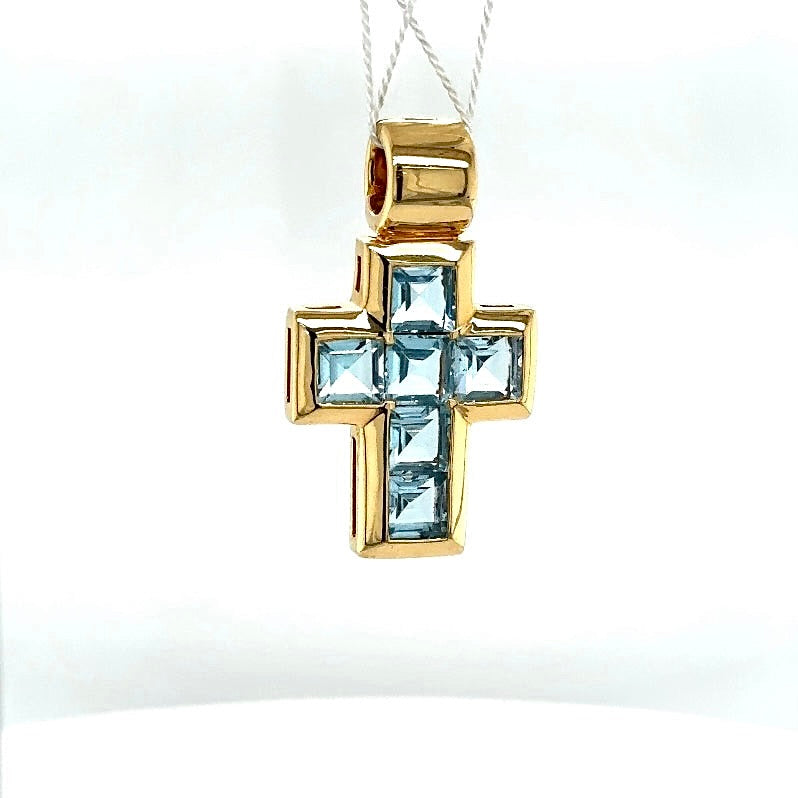 High-quality handmade cross pendant in 18 carat yellow gold with fine topazes