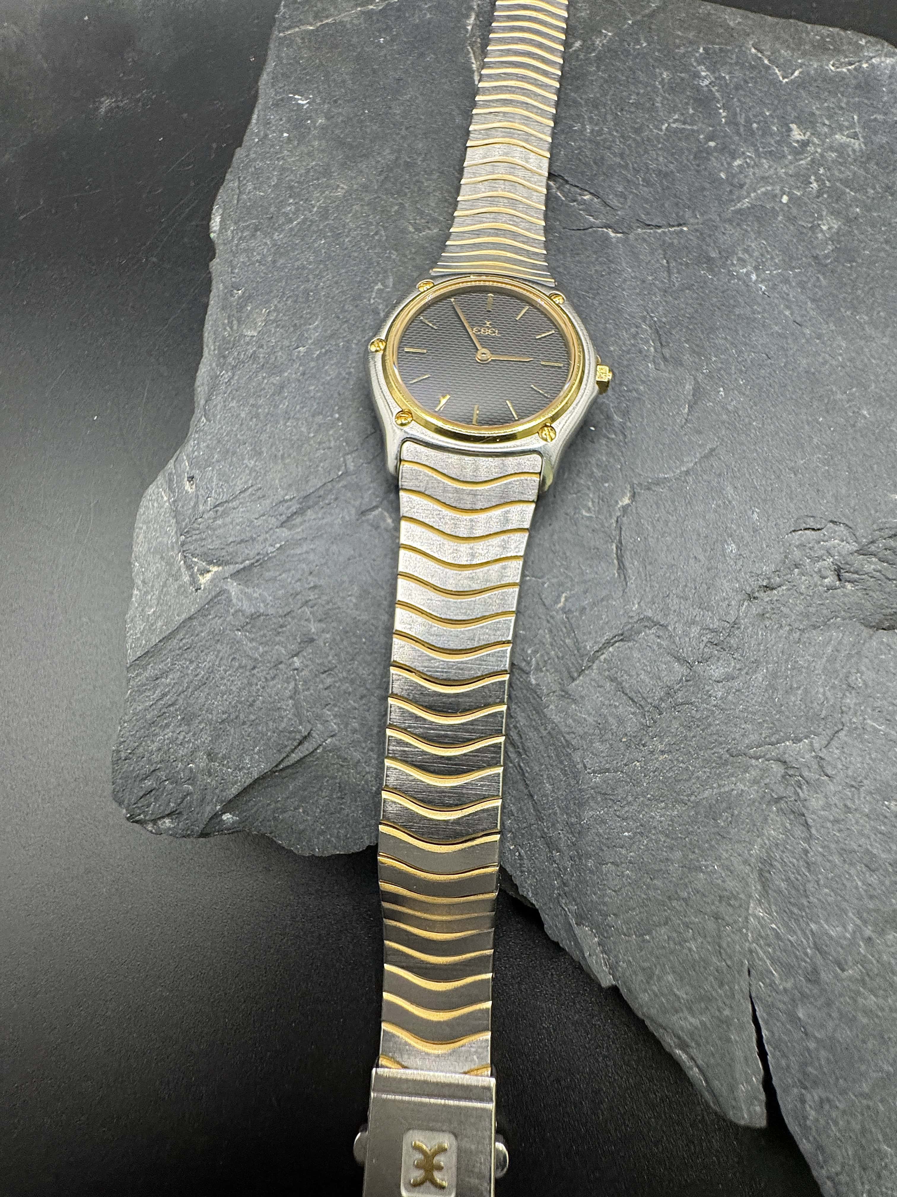 Ebel Sport Classique Damenuhr in Gold/Stahl mit schwarzem Zifferblatt