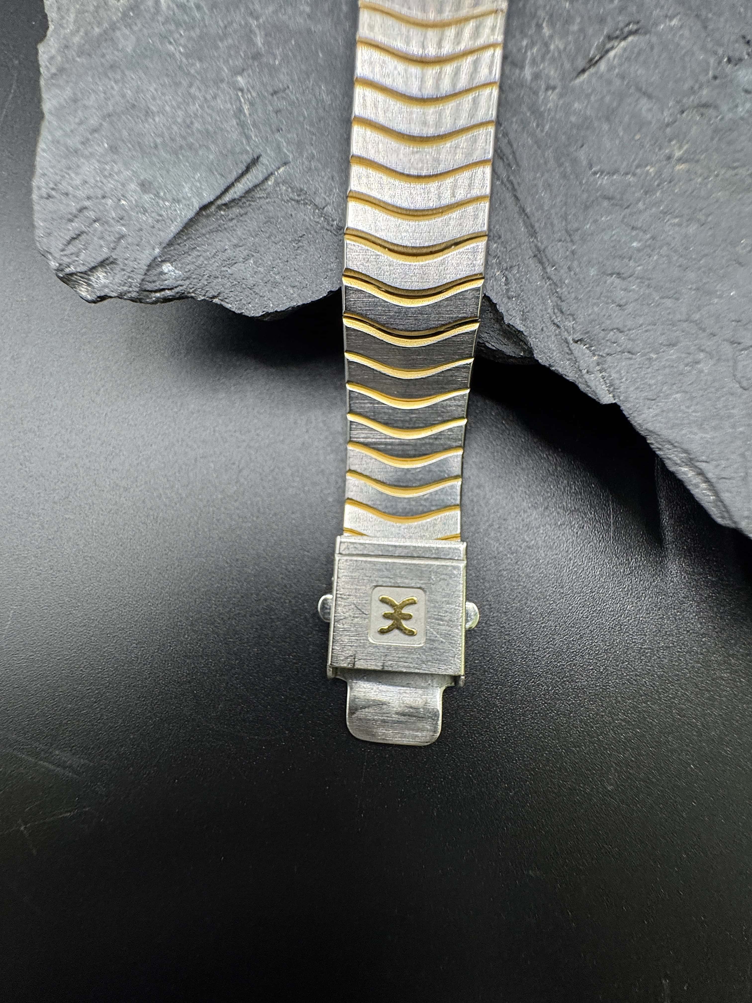 Ebel Sport Classique Damenuhr in Gold/Stahl mit schwarzem Zifferblatt