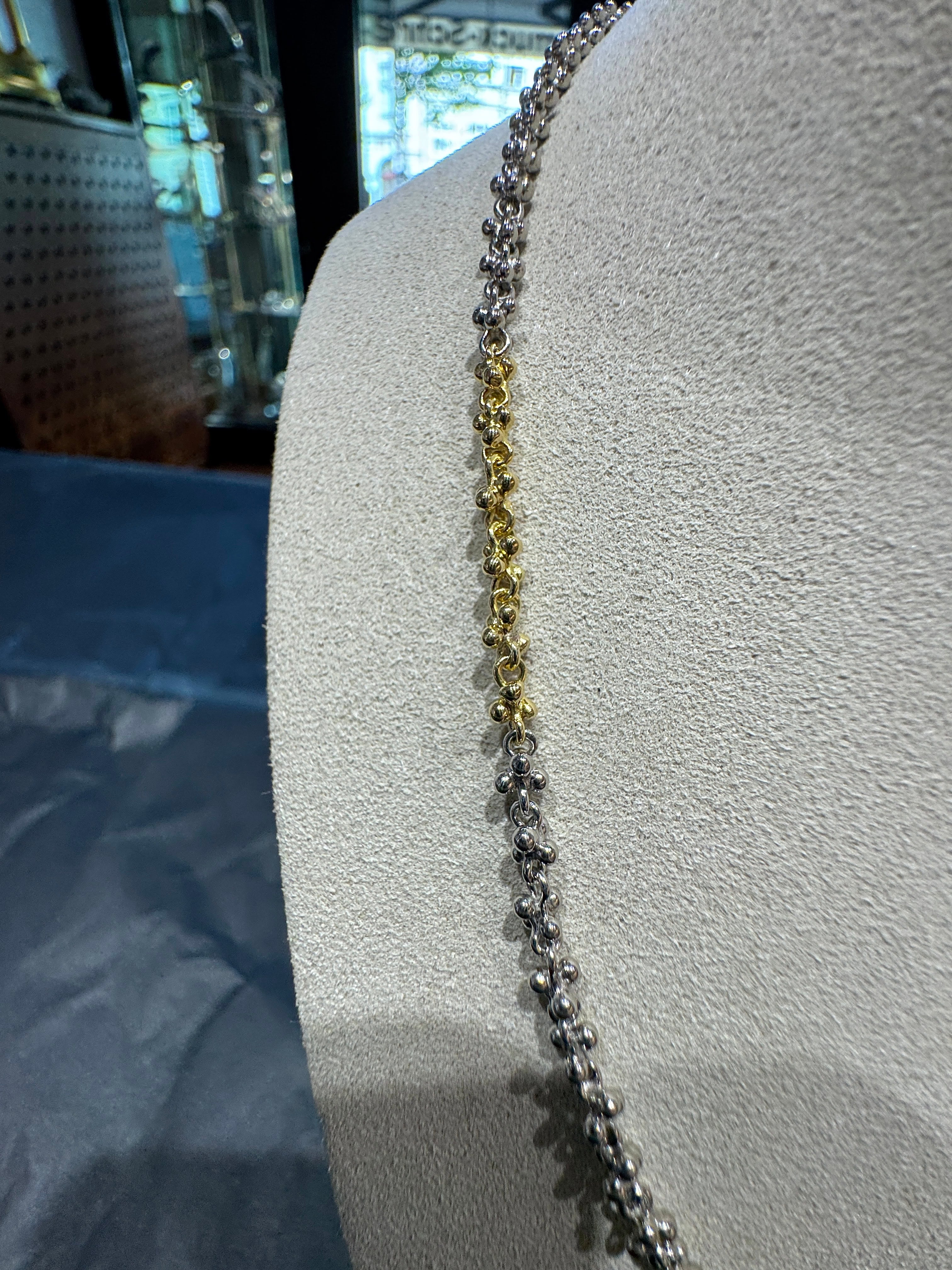 Ausgefallene Halskette in 18 Karat Gelbgold und 950er Platin