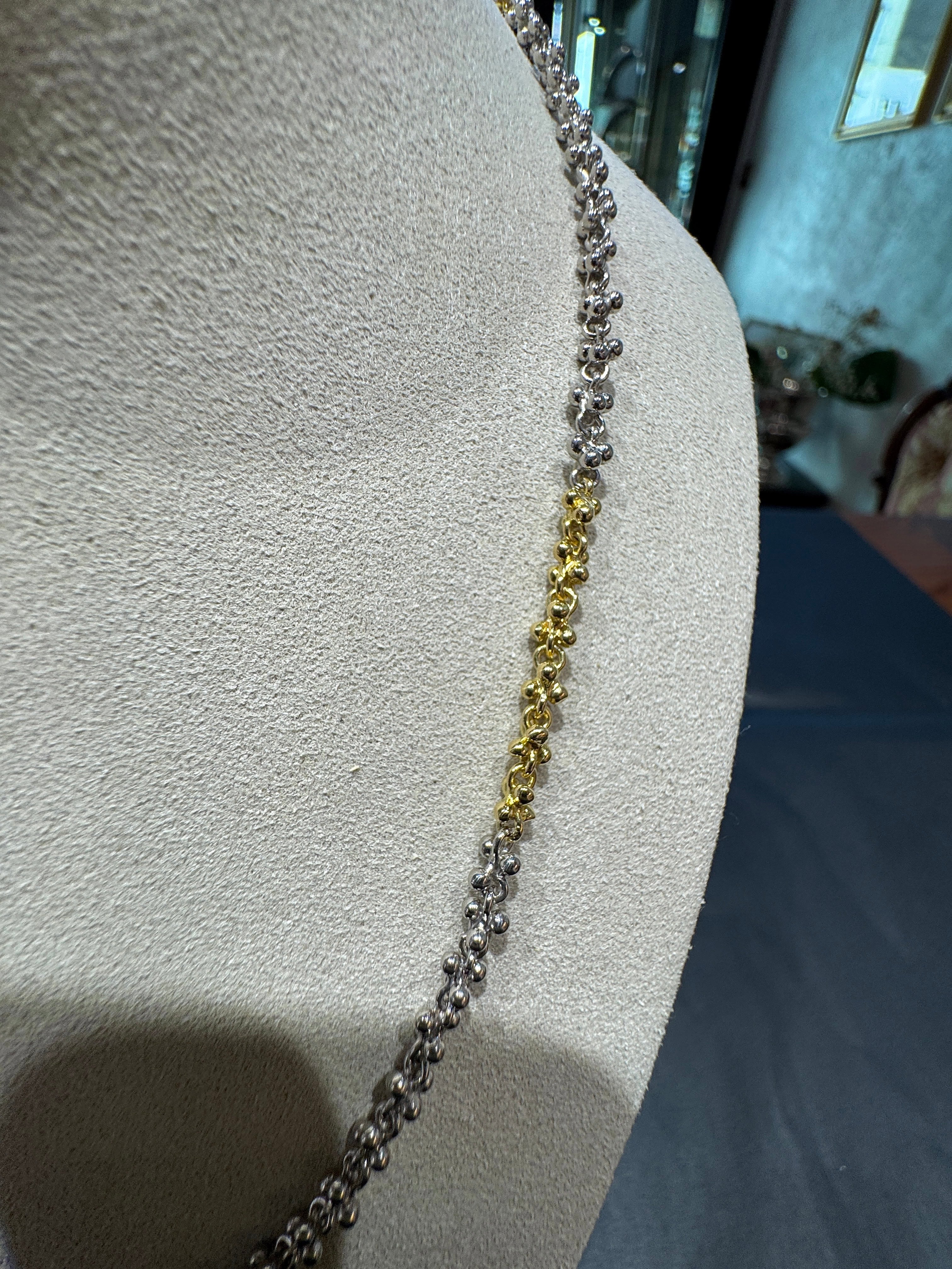 Ausgefallene Halskette in 18 Karat Gelbgold und 950er Platin