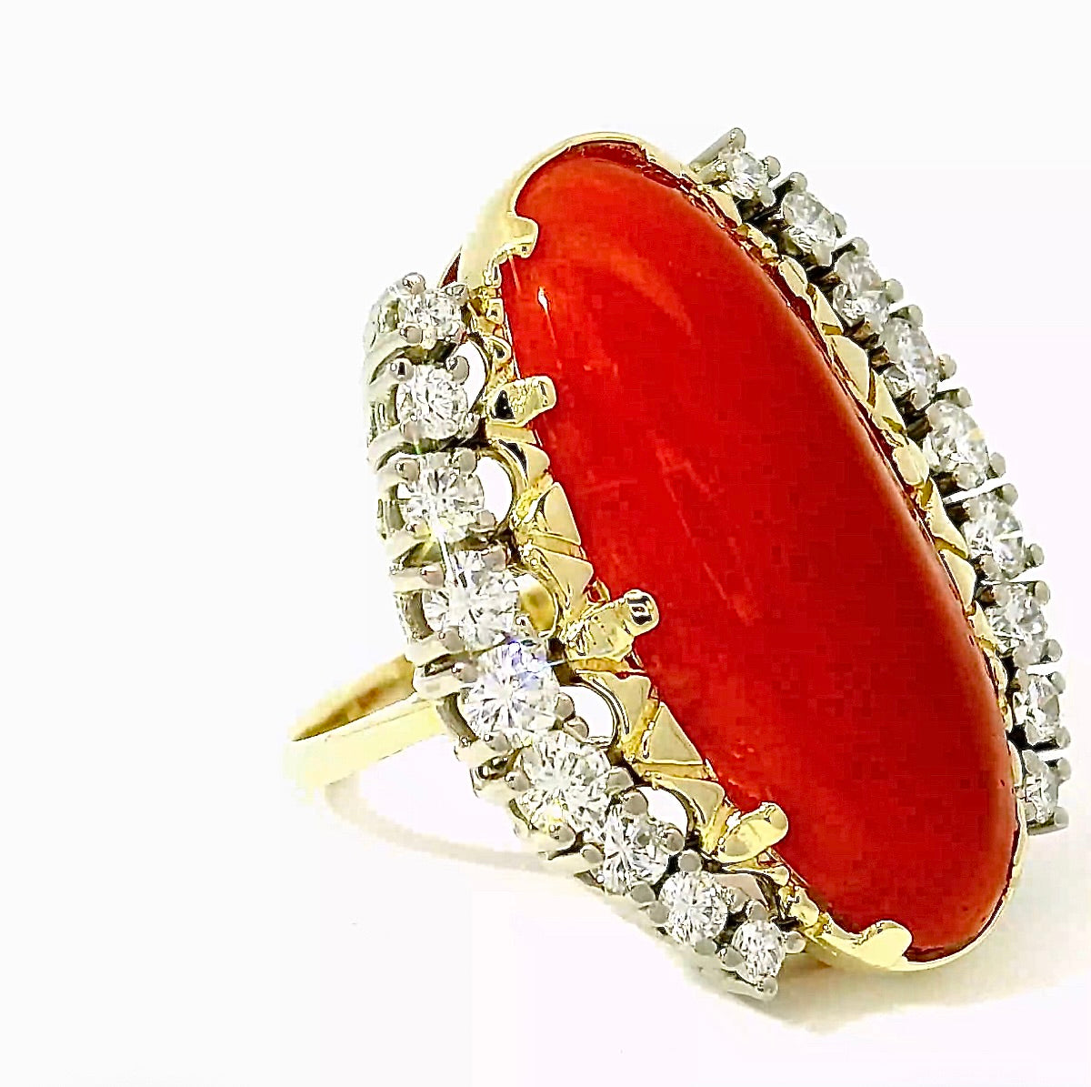 Extravagant cocktail ring in 14k yellow and white gold with fiery red coral and brilliant-cut diamonds