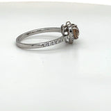 Modern and elegant solitaire ring in 18 carat white gold with a special heart diamond fancy color