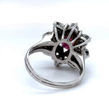 Timeless cocktail ring in 14 carat white gold with large rubies and fine brilliant-cut diamonds