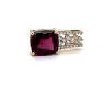 Modern gemstone pendant in 18 carat yellow gold with large rhodolite and fine brilliant-cut diamonds