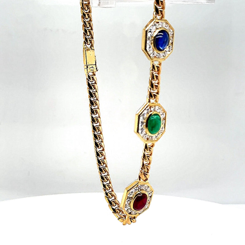 Elegante armband van 14 karaat geelgoud met edelstenen en diamanten 