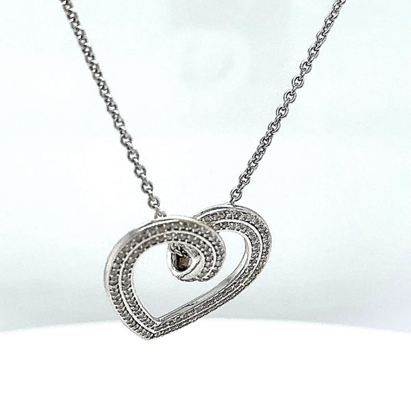 Elegant heart pendant with chain in 14 carat white gold with 148 fine brilliant-cut diamonds