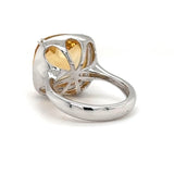 Modern white gold ring in 14 carat with a light yellow citrine and fine diamonds